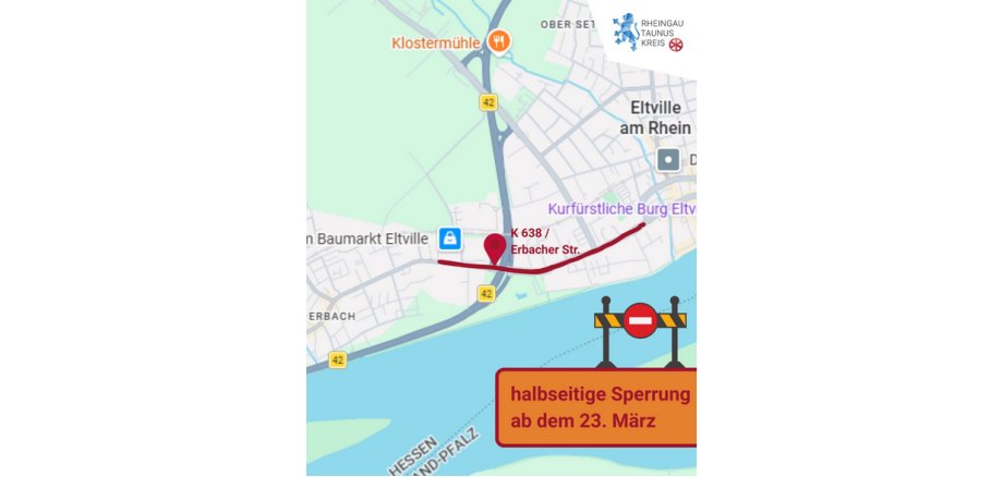 Gezeichnete Straßenkarte mit dem Rhein und Bächen in blau, Wiesen in grün und Orte in hellgrau und Straßen in dunkelgrau. Eine Straße ist rot markiert. Unten rechts ist eine Straßensperre gezeichnet mit einem Einbahnstraßenschild und einem orangenem Rechteck. 